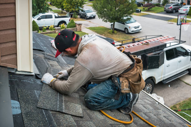 Professional Roofing technician working in Zionsville, IN